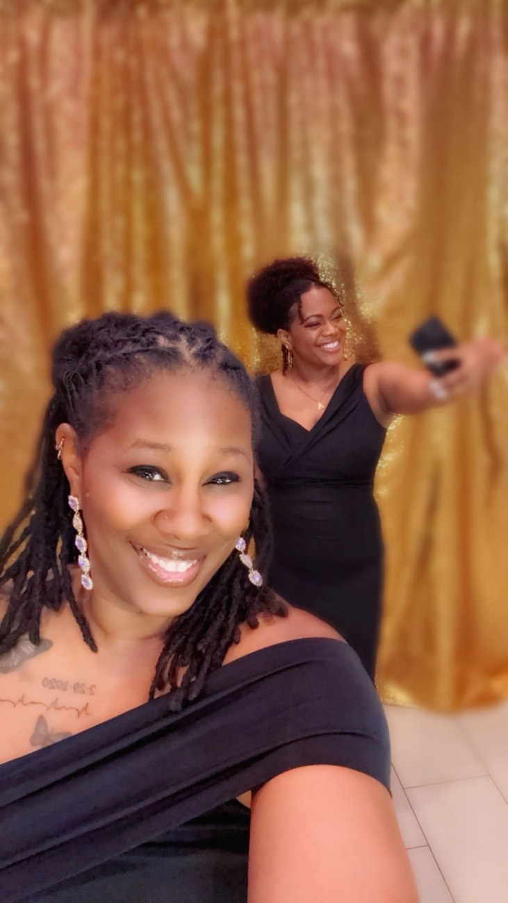 A joyful selfie at a formal event